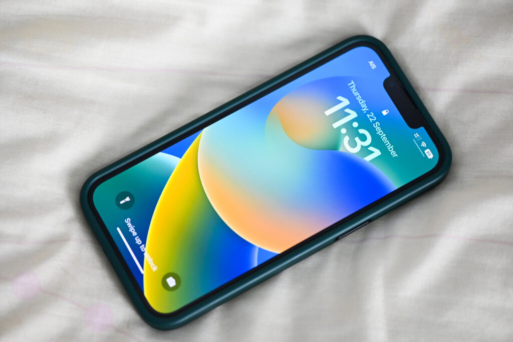 iPhone showing iOS 16 logo