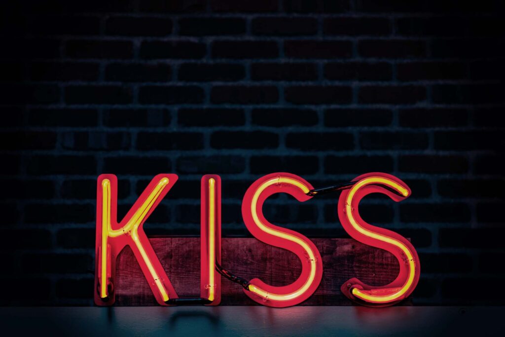 Neon sign spells: KISS